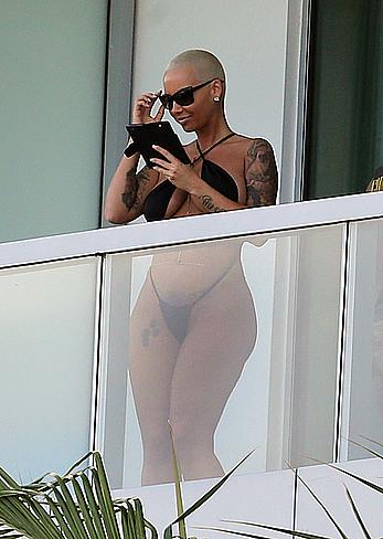 Amber Rose side of boob and big ass on a hotel balcony in Miami