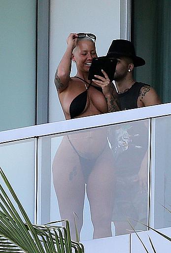 Amber Rose side of boob and big ass on a hotel balcony in Miami