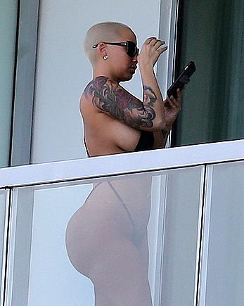 Amber Rose side of boob and big ass on a hotel balcony in Miami