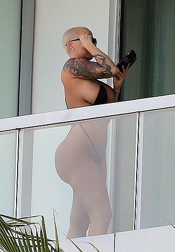 Amber Rose side of boob and big ass on a hotel balcony in Miami