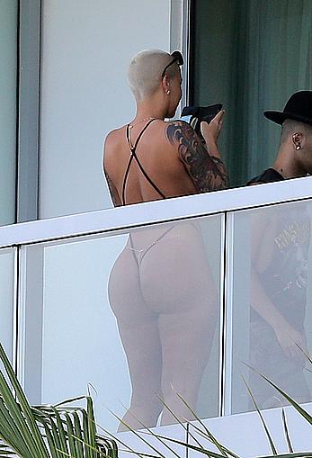 Amber Rose side of boob and big ass on a hotel balcony in Miami