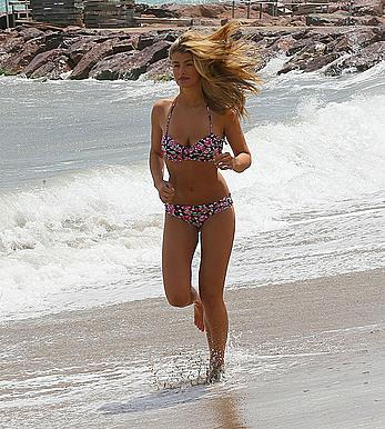 Amy Willerton in bikini at the beach in France