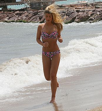 Amy Willerton in bikini at the beach in France