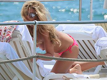 Amy Willerton sunbathing topless in Cannes