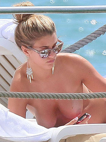 Amy Willerton sunbathing topless in Cannes