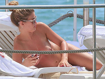 Amy Willerton sunbathing topless in Cannes