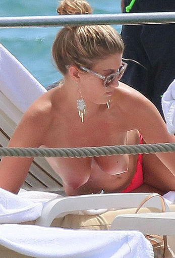 Amy Willerton sunbathing topless in Cannes