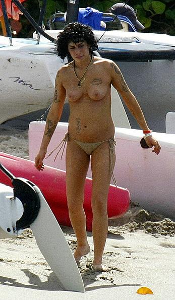 Amy Winehouse topless on a beach paparazzi photos