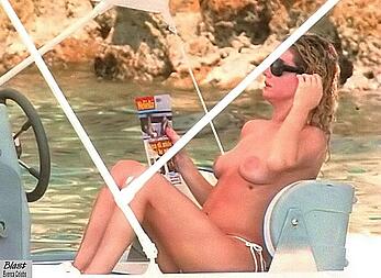 Angela Melillo topless on a beach and boat paparazzi shots