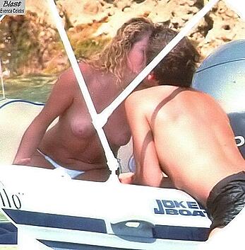 Angela Melillo topless on a beach and boat paparazzi shots