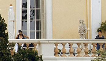 Angelina Jolie caught topless on the hotel balcony