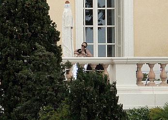 Angelina Jolie caught topless on the hotel balcony