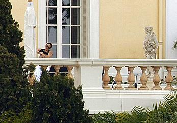 Angelina Jolie caught topless on the hotel balcony