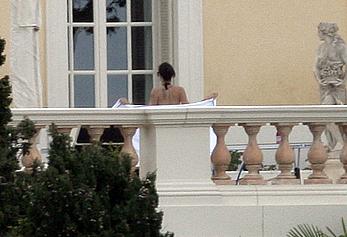 Angelina Jolie caught topless on the hotel balcony