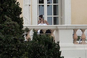 Angelina Jolie caught topless on the hotel balcony