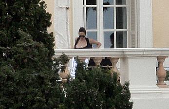 Angelina Jolie caught topless on the hotel balcony