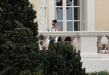 Angelina Jolie caught topless on the hotel balcony