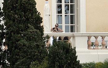 Angelina Jolie caught topless on the hotel balcony