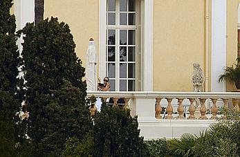 Angelina Jolie caught topless on the hotel balcony