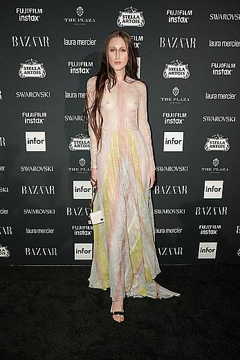 Anna Cleveland in a see through dress at Harper’s Bazaar Icons party