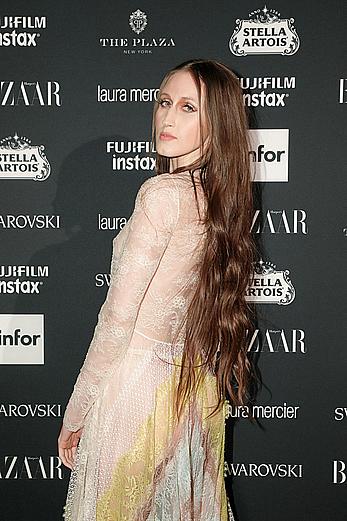 Anna Cleveland in a see through dress at Harper’s Bazaar Icons party