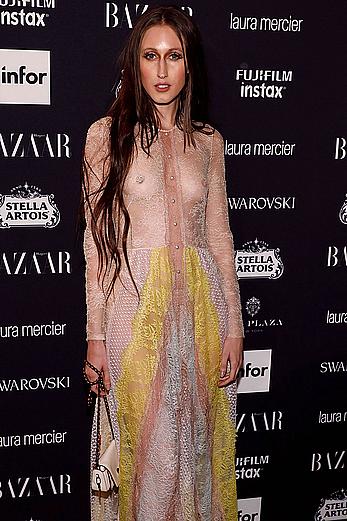 Anna Cleveland in a see through dress at Harper’s Bazaar Icons party