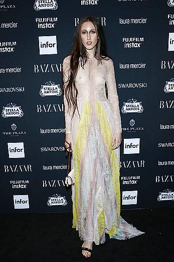 Anna Cleveland in a see through dress at Harper’s Bazaar Icons party