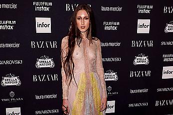 Anna Cleveland in a see through dress at Harper’s Bazaar Icons party