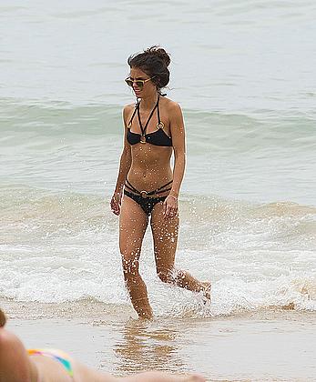 AnnaLynne McCord in black bikini on a beach in Sydney