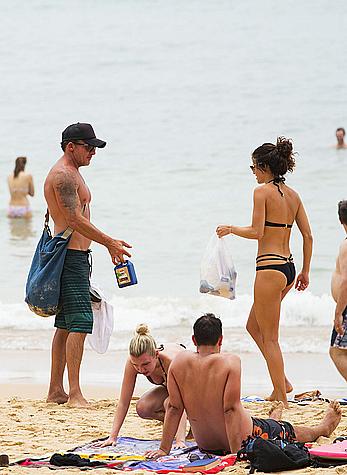 AnnaLynne McCord in black bikini on a beach in Sydney