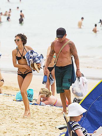 AnnaLynne McCord in black bikini on a beach in Sydney