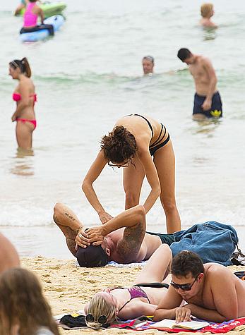 AnnaLynne McCord in black bikini on a beach in Sydney