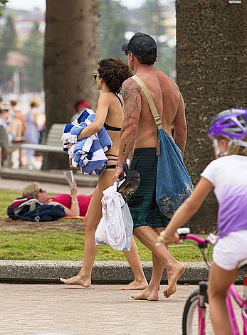 AnnaLynne McCord in black bikini on a beach in Sydney