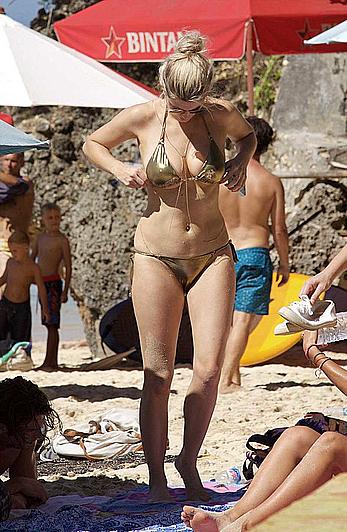 Ashley James cleavaeg in gold bikini in Bali