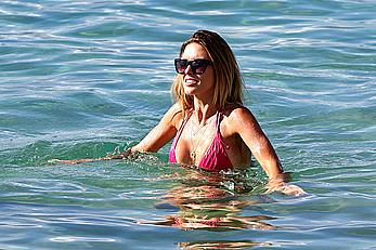 Audrina Patridge wearing a bikini at a beach in Hawaii