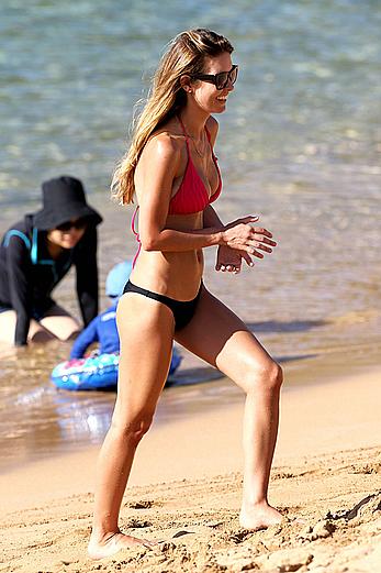 Audrina Patridge wearing a bikini at a beach in Hawaii