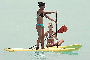 Ava Sambora paddle boarding on vacation in Bora Bora