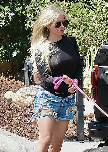 Avril Lavigne without bra in see through top in Calabasas