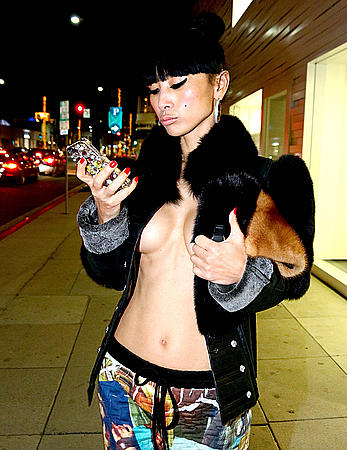 Bai Ling side of boob out & about