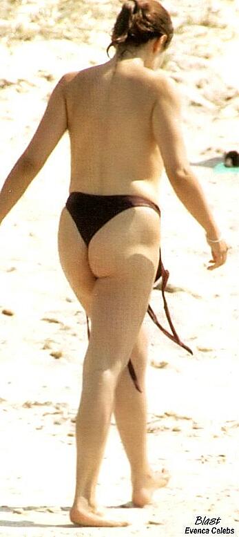 Barbara d'Urso topless on a bech paparazzi shots