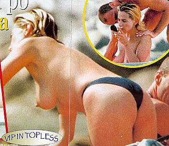 Barbara d'Urso topless on a bech paparazzi shots