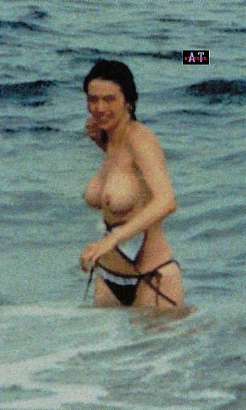 Beatriz Rico caught topless on a beach