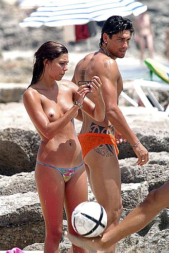 Belen Rodriguez caught topless on the beach in Spain