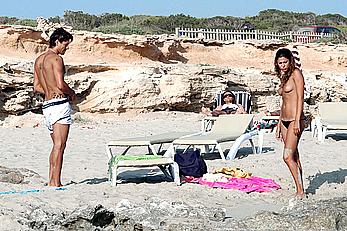 Belen Rodriguez caught topless on the beach in Spain