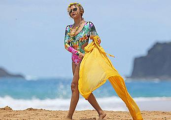 Beyonce Knowles in a swimsuit on a beach in Hawaii