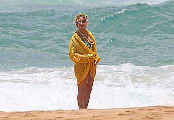 Beyonce Knowles in a swimsuit on a beach in Hawaii