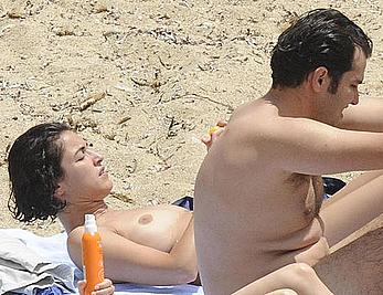 Blanca Romero caught topless on a beach