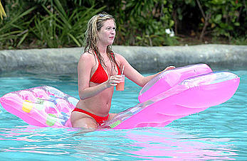 Brooke Kinsella in red bikini candids