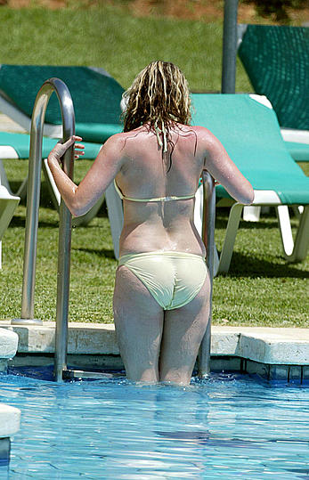 Brooke Kinsella sunbathing topless in Puerto Banus