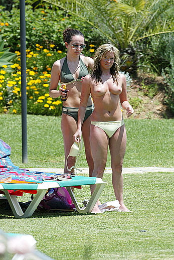 Brooke Kinsella sunbathing topless in Puerto Banus